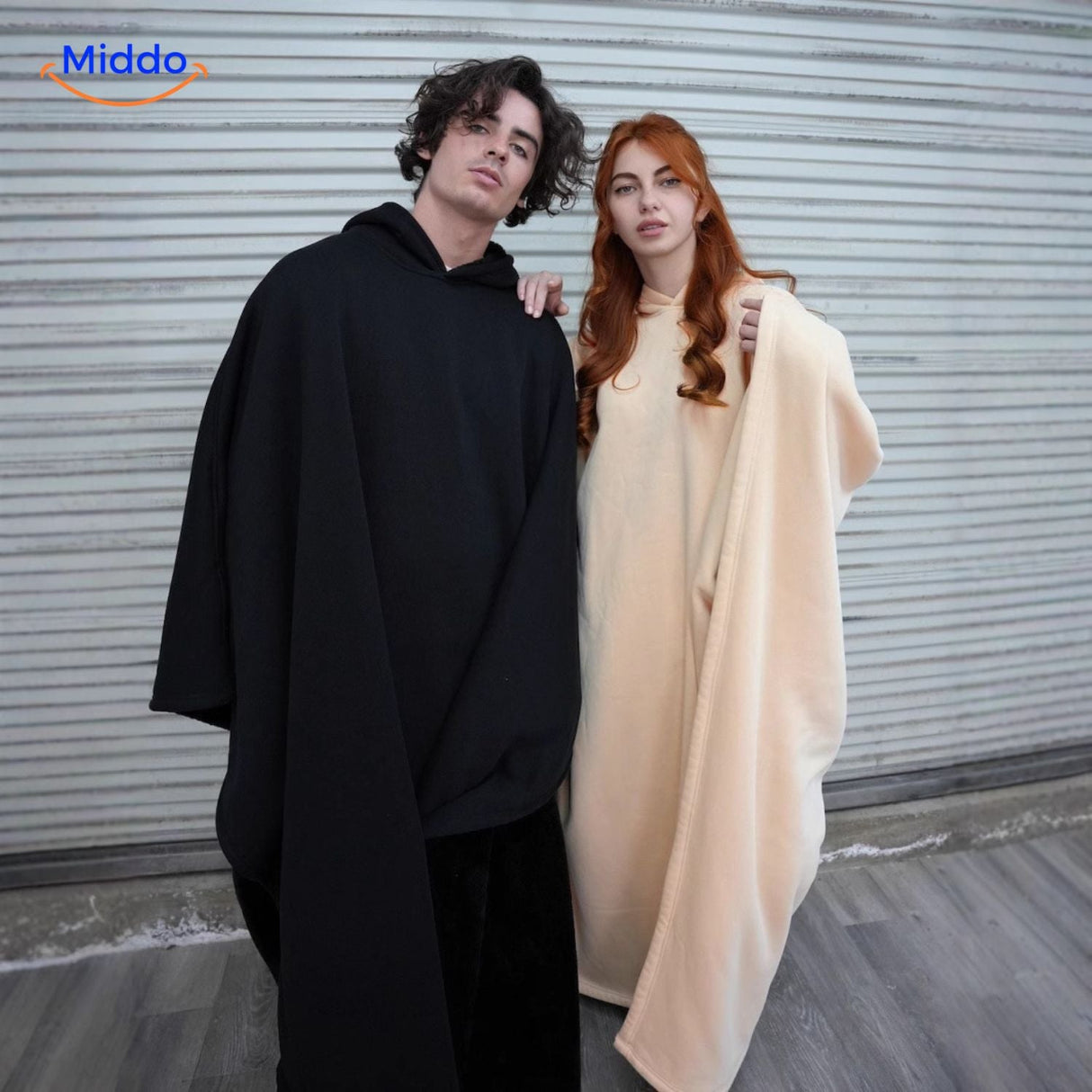 Fleece poncho met capuchon, valt als een deken om