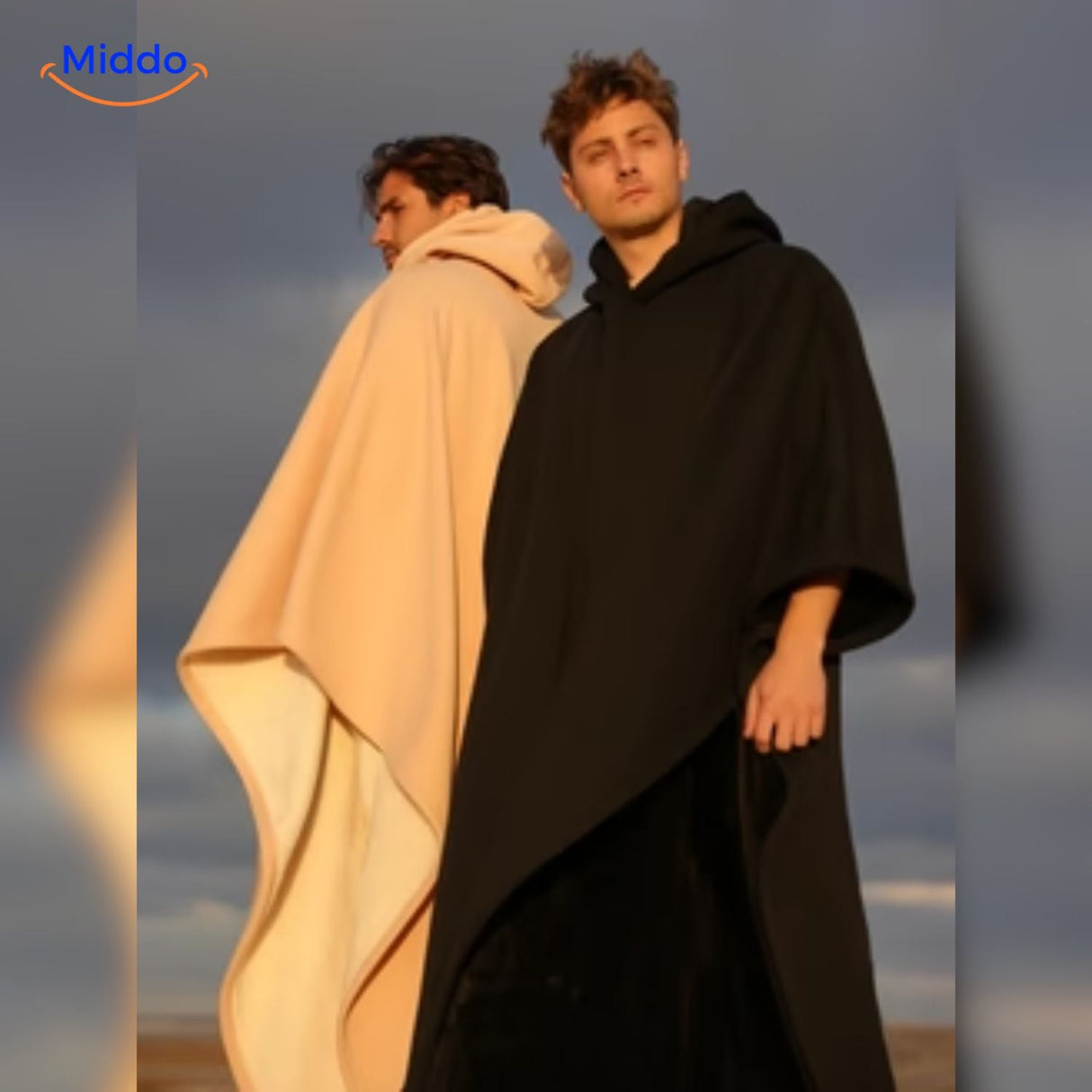 Fleece poncho met capuchon, valt als een deken om