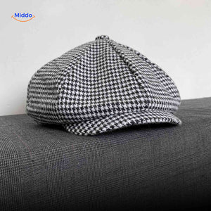 Flat cap van wolmix, 8-panel met knoopdetail, kleur extra fijn zwart/wit pied de poule