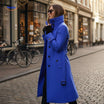 Lange damesmantel met knoopsluiting en opstaande kraag, kleur blauw
