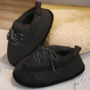 Pluche sneakerpantoffels met veters en gestikte zool, kleur zwart
