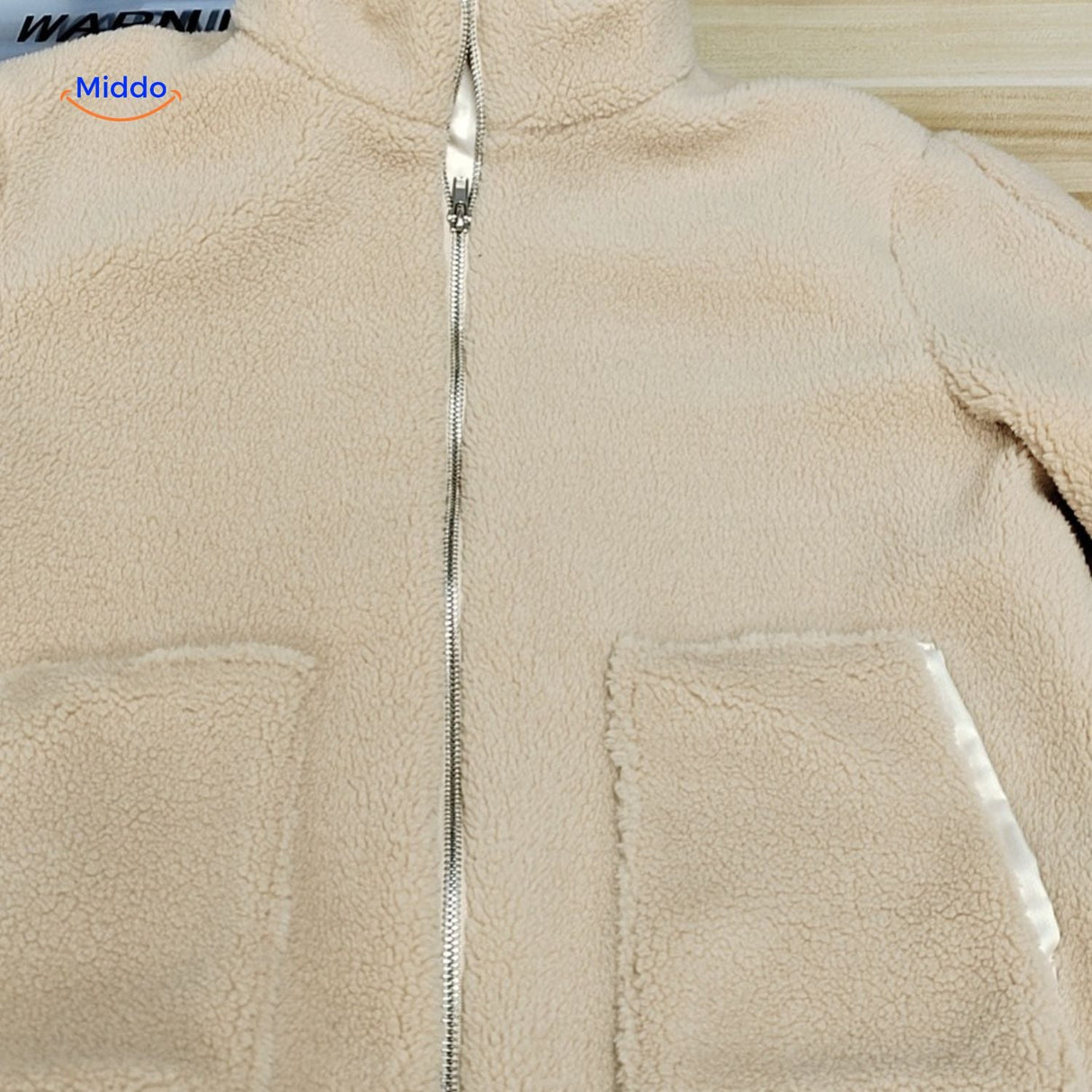 Oversized teddyjas met hoge kraag en twee steekzakken