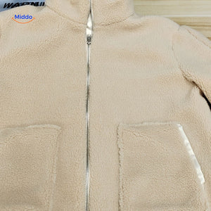 Oversized teddyjas met hoge kraag en twee steekzakken